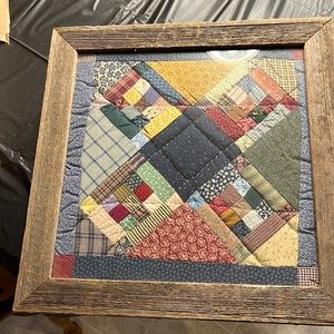 Homemade framed quilt piece wall hanging